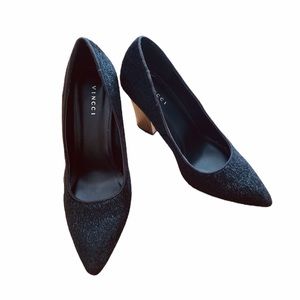 Black faux fur pointed toe heels